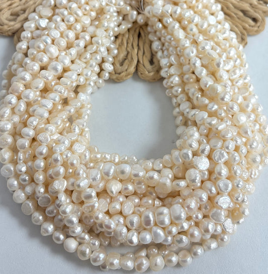 6-7mm White Irregular Round Freshwater Pearls